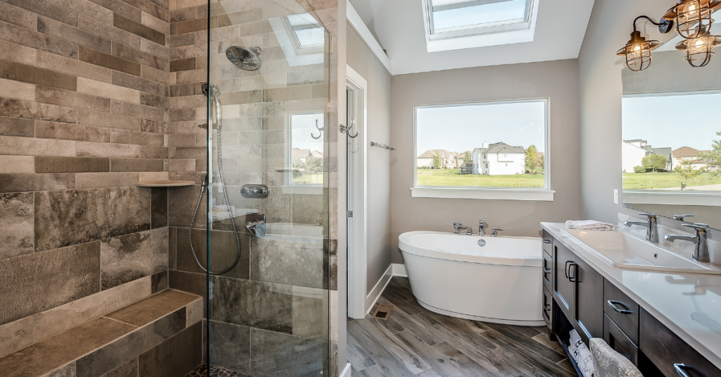 Spa-style bathroom with curbless shower and wood accent design.